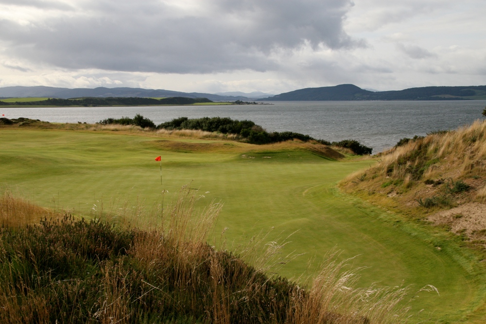 Large green, dunes et mer sur le parcours de Castle Stuart Large green, dunes et mer sur le parcours de Castle Stuart