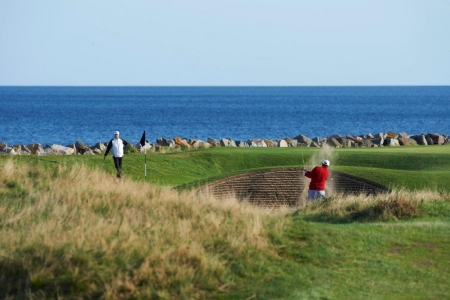 Golfeurs et mer lors du pro-am tomatin Golfeurs et mer lors du pro-am tomatin